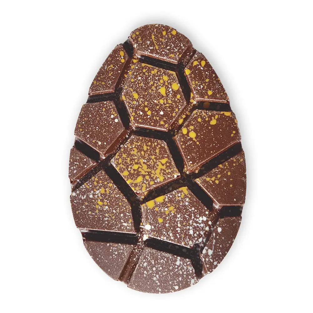 Tableta de xocolate artesanal en forma de huevo, y rellena de praliné de avellana